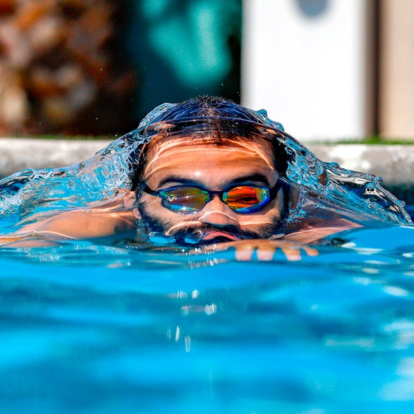 Swimmer wearing THEMAGIC5 BLUE MAGIC MIRROR GOLD